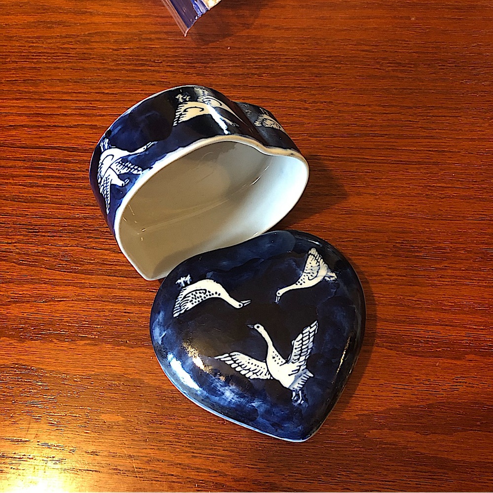 Blue heart shaped ceramic trinket box with geese